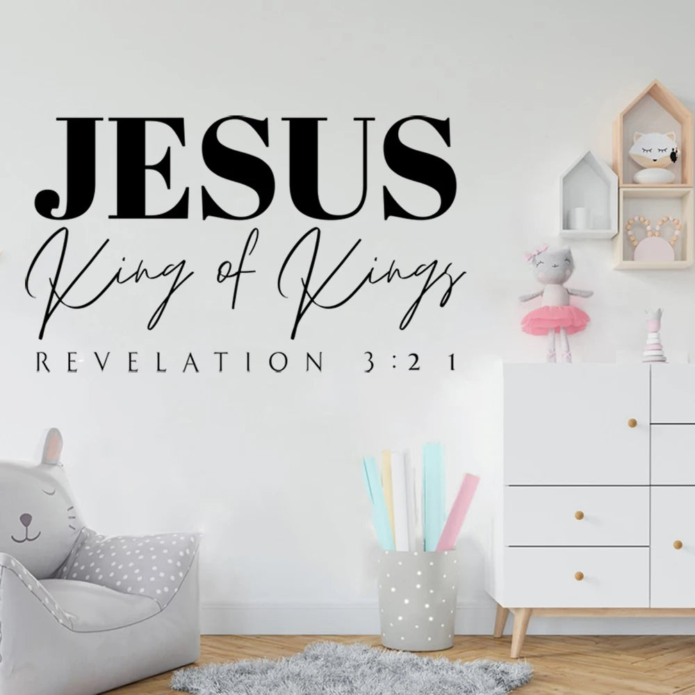 a child's room with a wall decal that says jesus king of kings