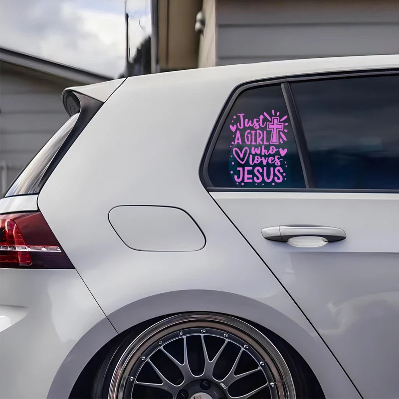 a white car with a pink sticker on it